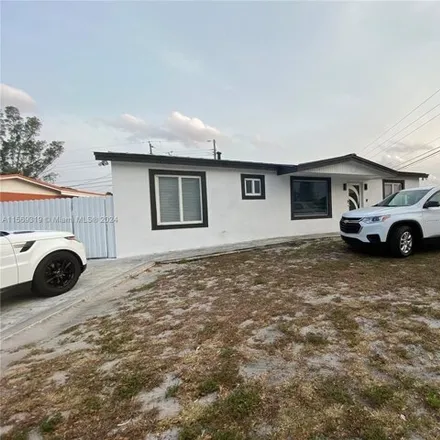 Buy this 4 bed house on 3630 Northwest 207th Street in Lakewood Estates, Miami Gardens