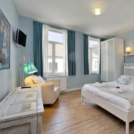 Rent this 4 bed townhouse on Bruges in Brugge, Belgium