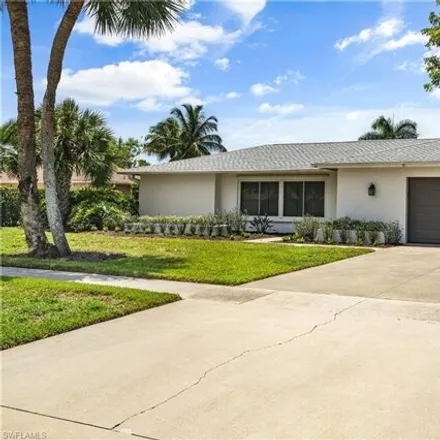 Rent this 4 bed house on 1018 Nottingham Drive in Collier County, FL 34109