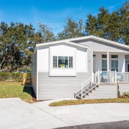 Buy this studio apartment on 1320 Hand Avenue in Ormond Beach, FL 32174