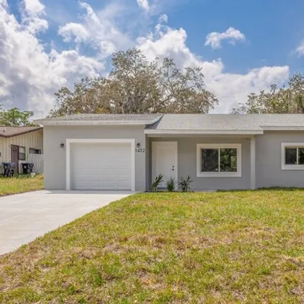 Buy this 5 bed house on 1428 Elm Terrace in Whispering Hills Golf Estates, Titusville