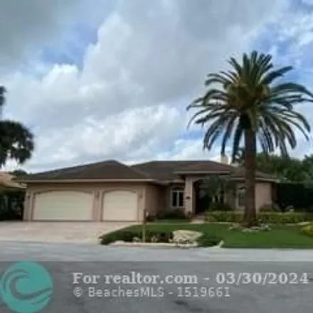 Rent this 3 bed house on 2615 Oak Tree Circle in Broward County, FL 33309