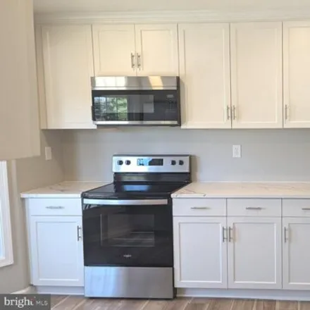 Buy this 3 bed condo on Blockton Lane in Anne Arundel County, MD 21114