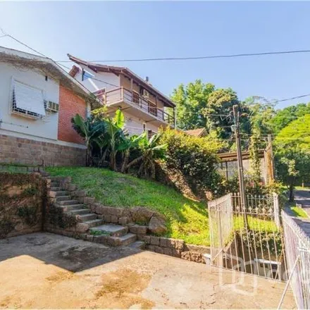 Buy this 3 bed house on Acesso dos Hibiscos in Santa Tereza, Porto Alegre - RS