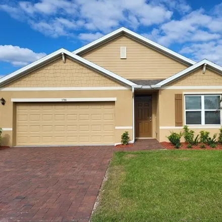 Rent this 4 bed house on Aberdeen Drive in Palm Bay, FL