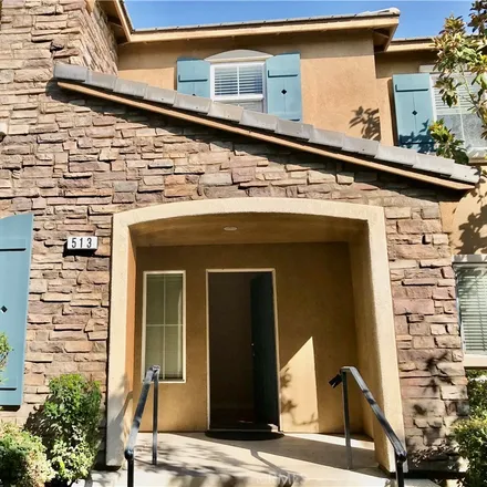 Rent this 4 bed townhouse on 501 East Flora Street in Ontario, CA 91764