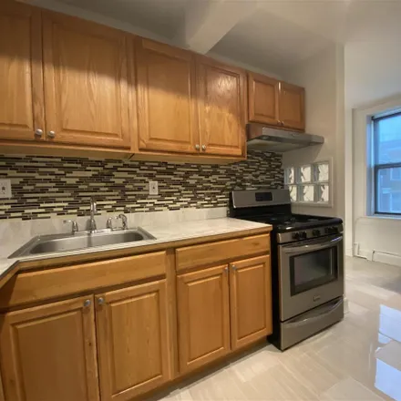 Rent this 2 bed townhouse on Torino Lighting Design in 320 Hoboken Avenue, Jersey City