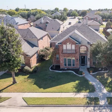 Buy this 4 bed house on 11789 Dalworth Drive in Frisco, TX 75035