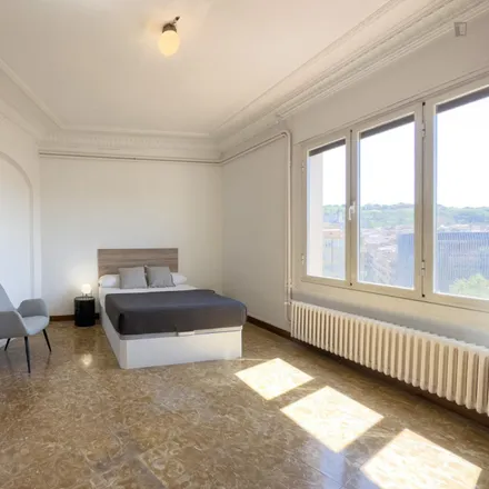 Rent this 11 bed room on Carrer Sant Pau in 119, 08001 Barcelona