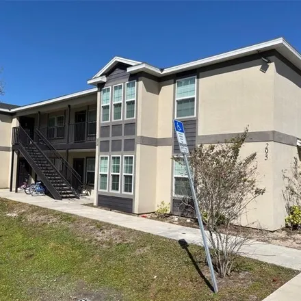 Rent this 3 bed apartment on Flower Lane in Buenaventura Lakes, FL 34743