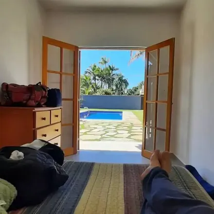 Rent this 5 bed house on Bertioga in Região Metropolitana da Baixada Santista, Brazil