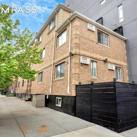 Buy this 7 bed house on 281 Lexington Avenue in New York, NY 11216