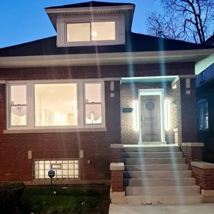Buy this 4 bed house on 7558 South Doctor Martin Luther King Junior Drive in Chicago, IL 60619