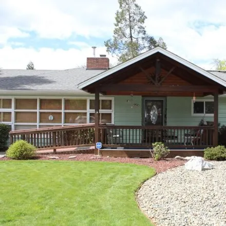 Buy this 4 bed house on 948 Northeast 9th Street in Grants Pass, OR 97526