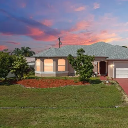 Buy this 3 bed house on 2747 Southwest Palace Avenue in Port Saint Lucie, FL 34987