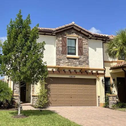 Rent this 4 bed townhouse on 4238 Caryota Drive in Palm Beach County, FL 33436