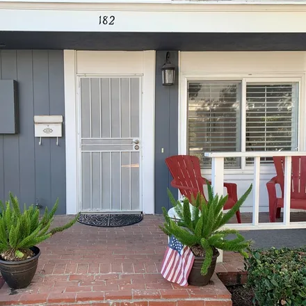 Rent this 3 bed townhouse on 182 Brookline Lane in Thurin, Costa Mesa
