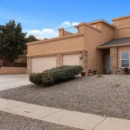 Buy this 5 bed house on 6424 Grayson Hills Drive Northeast in Rio Rancho, NM 87144
