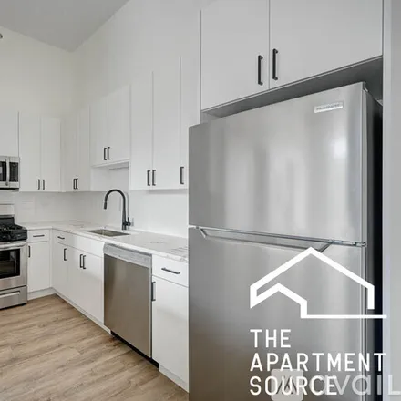 Rent this 2 bed apartment on 4731 N Western Ave