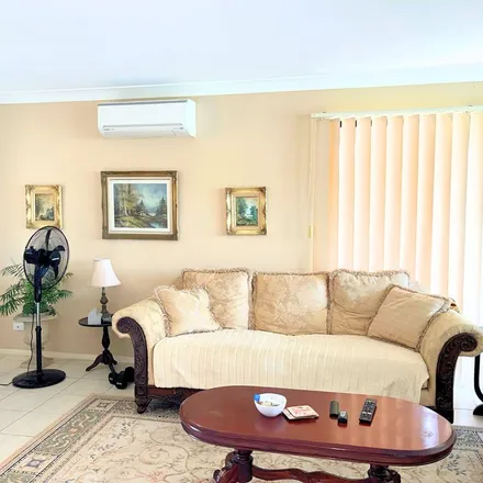 Rent this 3 bed townhouse on Christine Ave at Regensberg Close in Christine Avenue, Varsity Lakes QLD 4227