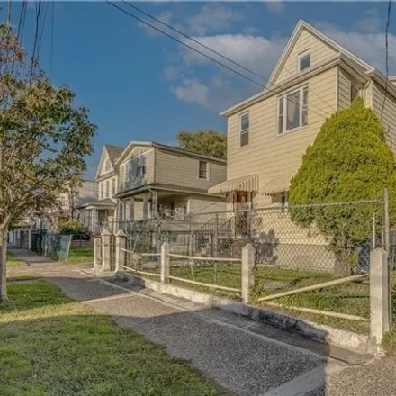 Buy this 11 bed house on 89 North Burgher Avenue in New York, NY 10310