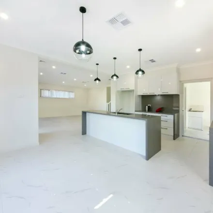 Rent this 5 bed apartment on 86 Audley Circuit in Gregory Hills NSW 2557, Australia