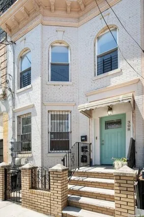 Buy this 6 bed house on 308 Ashford Street in New York, NY 11207