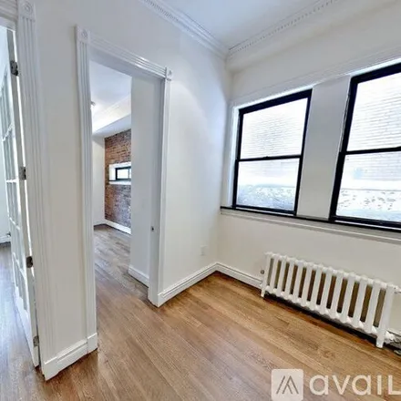 Rent this 4 bed duplex on 450 W 50th St