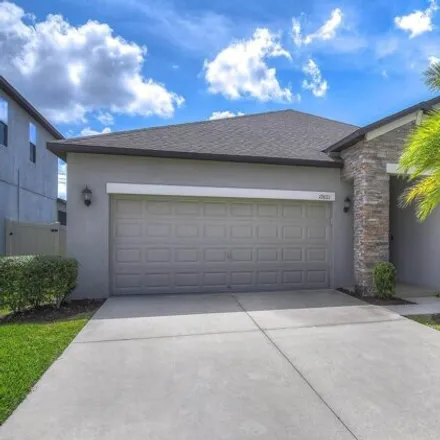 Buy this 4 bed house on 10621 Bahama Woodstar Ct in Riverview, Florida