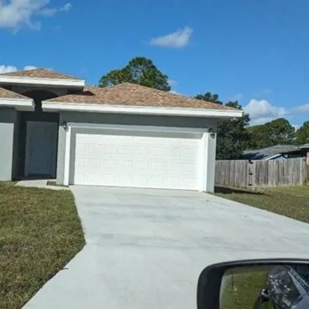 Rent this 3 bed house on 464 Iroquois Avenue Northwest in Palm Bay, FL 32907