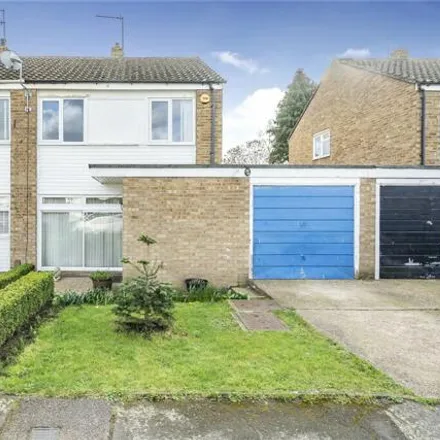 Buy this 3 bed duplex on Roakes Avenue in Chertsey, KT15 2HG