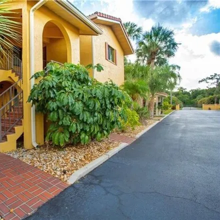 Rent this 2 bed condo on Baymont by Wyndham Bonita Springs Naples North in 9800 Citadel Lane, Bonita Springs