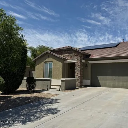 Rent this 3 bed house on 16152 West Desert Flower Drive in Goodyear, AZ 85395