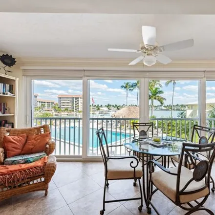 Buy this 2 bed condo on Jennifer Shores in Gulf Shore Boulevard North, Naples