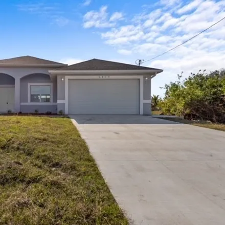 Buy this 4 bed house on 1699 Wellington Avenue in Lehigh Acres, FL 33972
