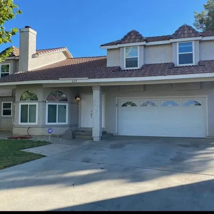 Rent this 4 bed house on 501 Spruce Court in Palmdale, CA 93550