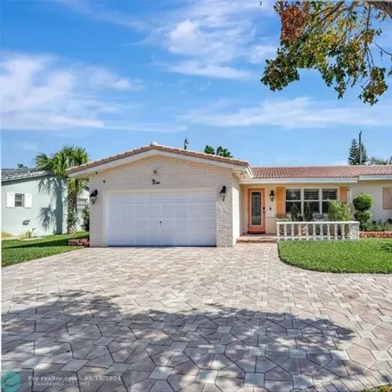 Buy this 4 bed house on 7841 Northwest 40th Court in Coral Springs, FL 33065