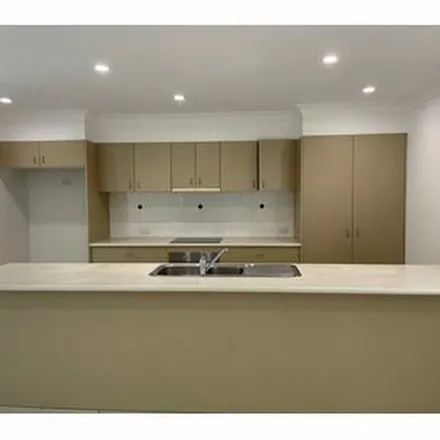 Rent this 4 bed apartment on 4 Coomera Heights Drive in Pimpama QLD 4209, Australia