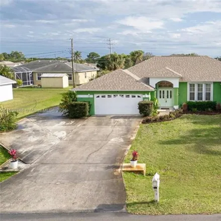 Buy this 3 bed house on 6786 Northwest Daffodil Lane in Port Saint Lucie, FL 34983