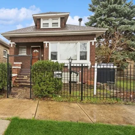Buy this 4 bed house on 1621 North Lorel Avenue in Chicago, IL 60639
