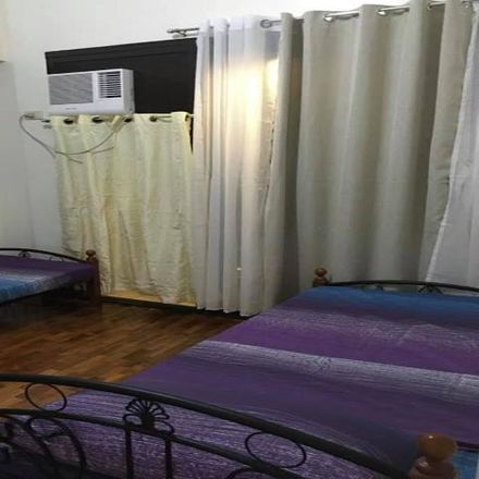Rent this 2 bed condo on Triplex in Chino Roces Avenue, Makati