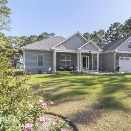 Buy this 4 bed house on 1598 Grove Point Road in New Hanover County, NC 28409