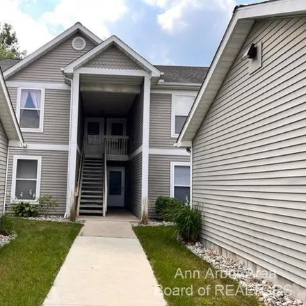 Rent this 2 bed condo on 1441 Heatherwood Lane in Pittsfield Township, MI 48108