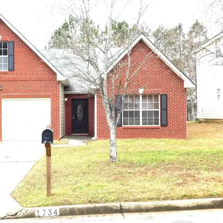 Buy this 4 bed house on 1732 Spring Hill Cove in Stonecrest, GA 30058