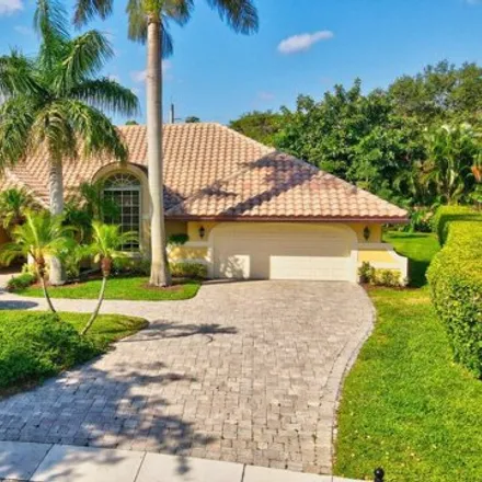 Buy this 4 bed house on 2896 Northwest 26th Street in Boca Raton, FL 33434