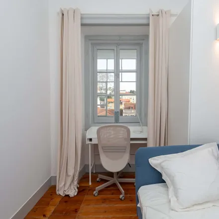 Rent this 6 bed room on Airbnb in Rua do Carrião, 1150-251 Lisbon