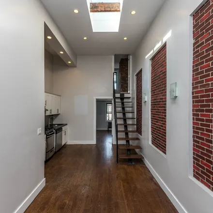 Rent this 4 bed apartment on 64 Troutman Street in New York, NY 11221
