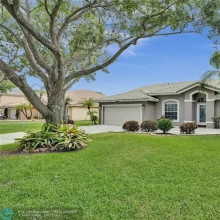 Buy this 3 bed house on 1486 Northwest 102nd Way in Coral Springs, FL 33071