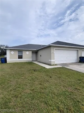 Rent this 2 bed house on 4614 22nd Street Southwest in Lehigh Acres, FL 33973