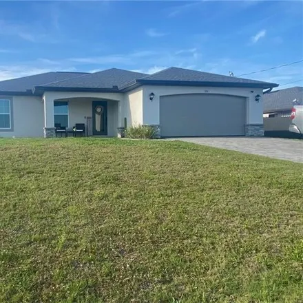 Rent this 3 bed house on 601 Northwest 32nd Street in Cape Coral, FL 33993